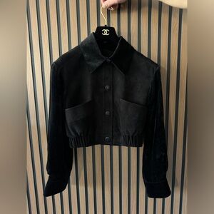 Chanel 2022 Lambskin Denim
Jacket w/ Tags size 34 Black